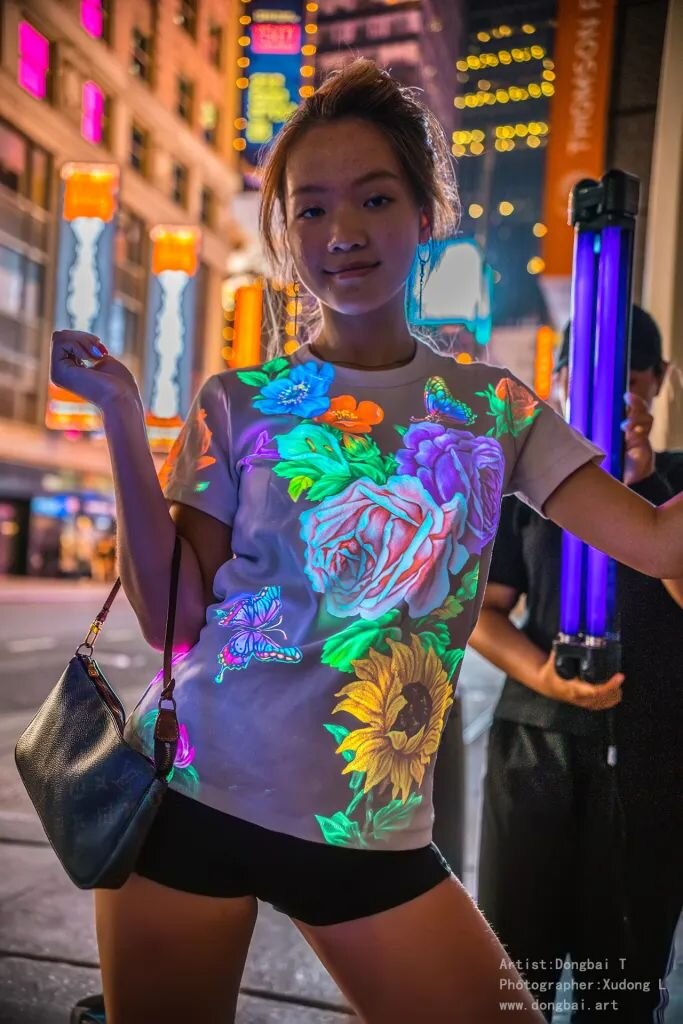 Invisible glowing dress art visible only under blacklight