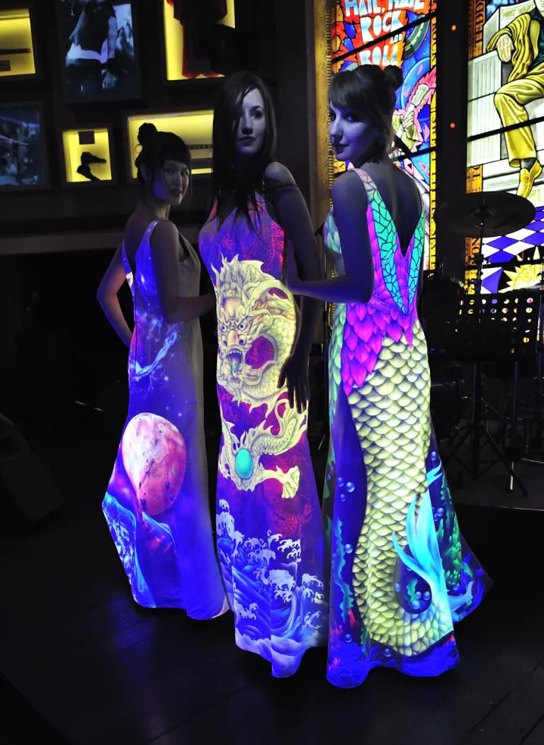 Hand-painted glowing dress under UV light