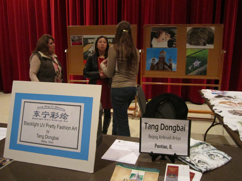 Dongbai Tang artwork featured at a public event